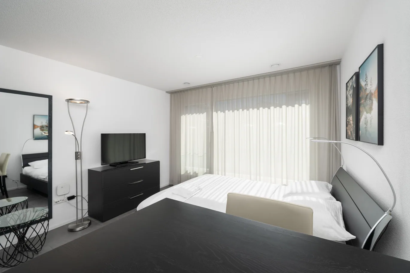 Schlaf- und Wohnbereich eines Apartments Marketplace Studios
